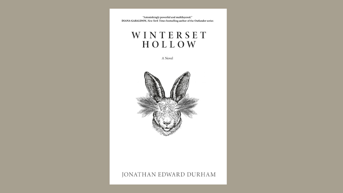Avskalat bokomslag i svartvitt. Träsnitt av en kanin med vete växande ur ögonhålorna. Titeln är Winterset Hollow.